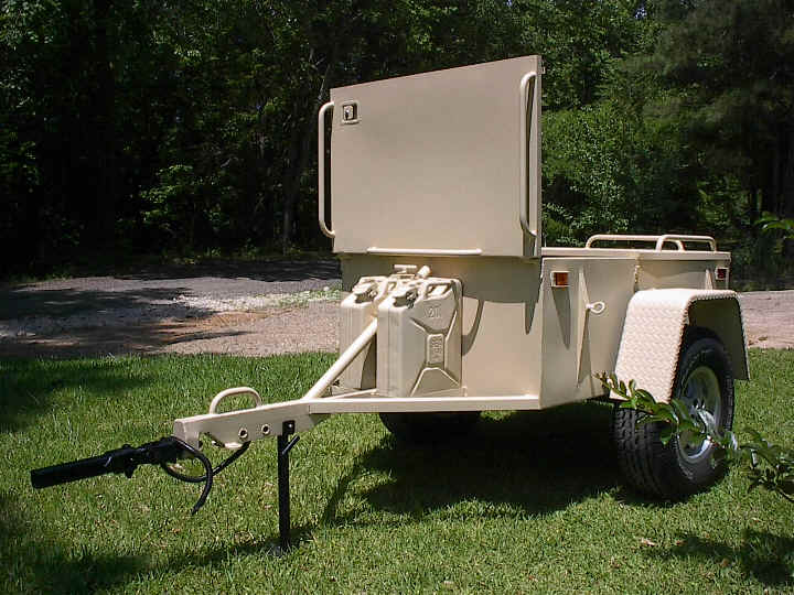 Tan utility trailer with jerry cans and a spare tire