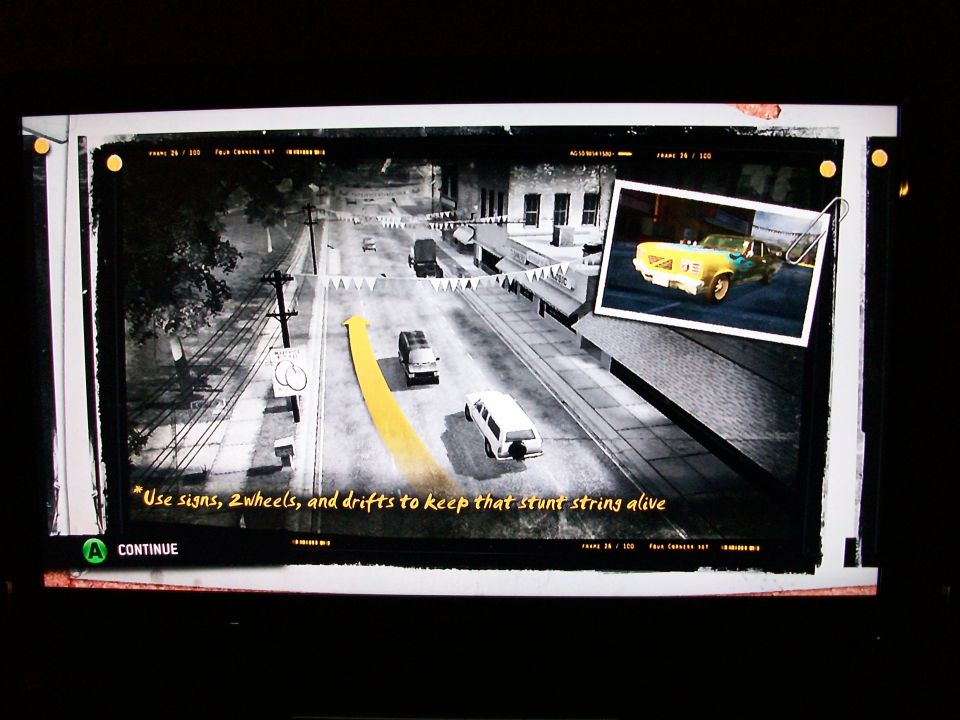 Video game screenshot showing a yellow and blue car with flames, with game instructions.