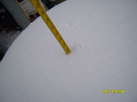 1989 Ford Bronco - A yellow measuring tape is used to measure snow depth on December 22, 2008.