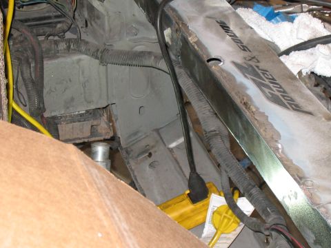 2001 Pontiac Trans Am - Close-up view of engine bay components, including wiring and a metal part with text.