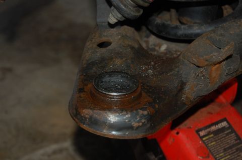 1985 Mercury Grand Marquis - This image shows a close-up view of a worn ball joint assembly, likely requiring replacement.