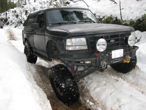 1979 Ford Bronco - This black Ford Bronco is equipped for off-road adventures in snowy conditions.