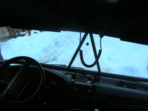 1996 Ford Bronco - Driving through deep snow on a winter day, seen from the driver's perspective.