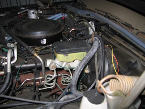 1991 Ford LTD Crown Victoria - Close-up view of the engine bay, showing various components and wiring.