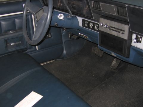 1991 Ford LTD Crown Victoria - Interior view of a car showing the dashboard, steering wheel, and seats.