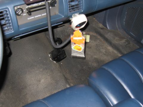 1991 Ford LTD Crown Victoria - Interior view of a car showing the dashboard, seats, and floor mats.