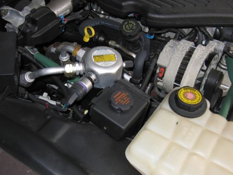1991 Ford LTD Crown Victoria - Photograph of an engine compartment, not a technical document.