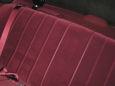 1991 Ford LTD Crown Victoria - Photograph of a rear bench seat, not a technical document.