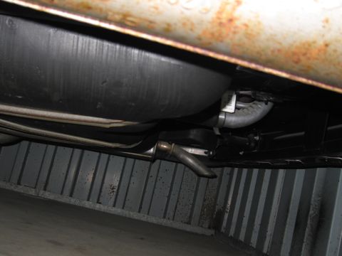 1991 Ford LTD Crown Victoria - Photograph of a vehicle undercarriage, not a technical document.