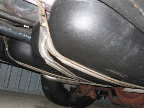 1991 Ford LTD Crown Victoria - Photograph of a vehicle undercarriage, not a technical document.