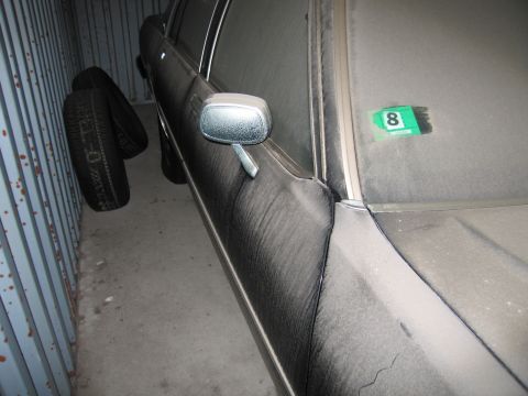 1991 Ford LTD Crown Victoria - Photograph of a vehicle side, not a technical document.