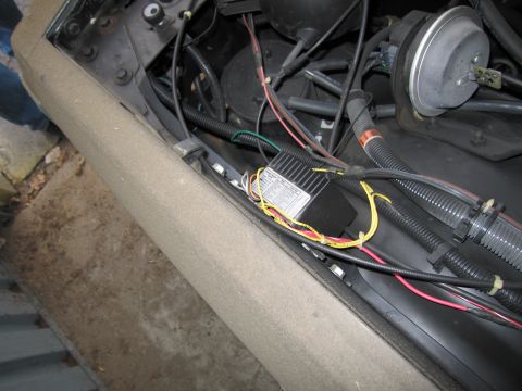 1991 Ford LTD Crown Victoria - Photograph of engine-bay wiring and a relay, not a technical document.