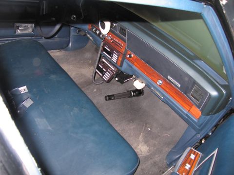 1991 Ford LTD Crown Victoria - Photograph of a vehicle interior, dashboard and bench seat, not a technical document.