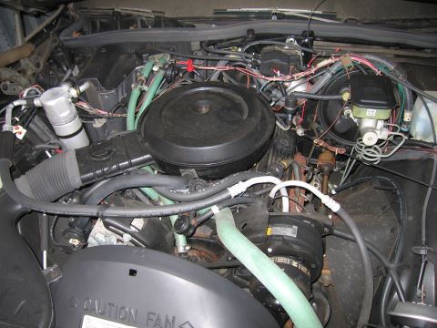 1991 Ford LTD Crown Victoria - Photograph of a vehicle engine compartment, not a technical document.