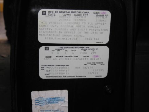1991 Ford LTD Crown Victoria - General Motors manufacture/certification data plate showing GVWR, GAWR and the vehicle identification number.