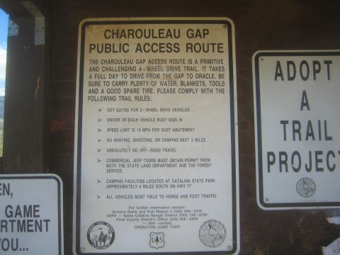 1968 Ford Mustang - photograph of a posted trail-rules sign, not a vehicle technical document.