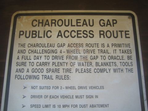 1968 Ford Mustang - close-up photograph of a posted trail sign, not a vehicle technical document.
