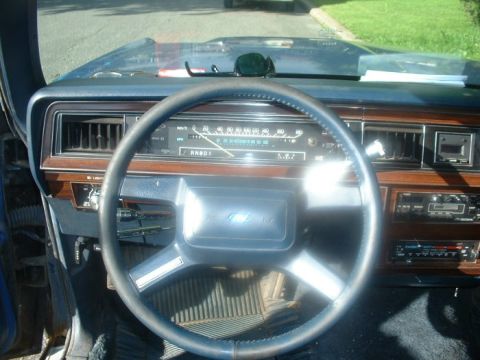 1987 Ford Crown Victoria LTD - Interior view of a 1987 Ford Crown Victoria LTD, the dashboard and steering wheel.