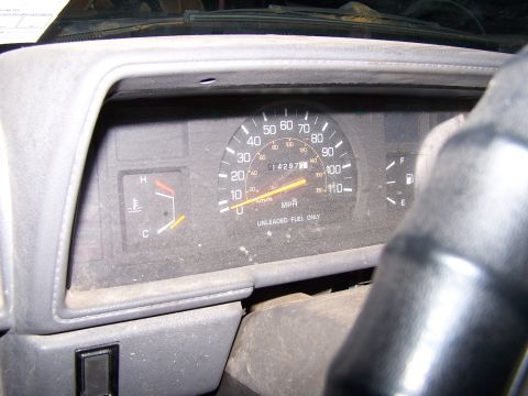 1988 Toyota Pickup/SR5 - The odometer shows 14,297 miles on this 1988 Toyota Pickup/SR5 interior.