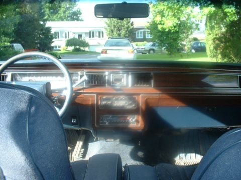 1987 Ford Crown Victoria LTD - View from the driver's seat shows the dashboard and a white car parked outside.