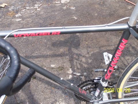 1988 Toyota Pickup/SR5 - Close-up of a Schwinn Voyageur bicycle frame, with visible drivetrain components.