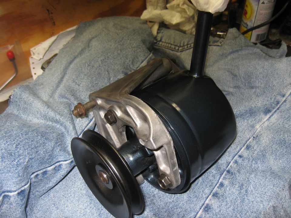 Power steering pump with pulley, dark blue housing, and metal bracket
