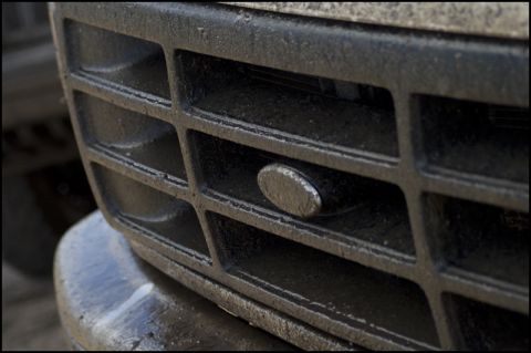1996 Ford F-150 - Close-up of the front grille and emblem on a 1996 Ford F-150.