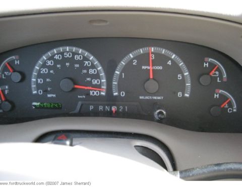 2007 Ford Mustang - Dashboard gauges for a 2007 Ford Mustang, including speedometer and tachometer.