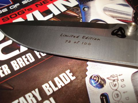 2000 Ford Crown Victoria - Close-up of a knife blade showing 'Limited Edition 72 of 100' engraving.
