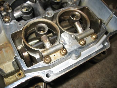 1978 Ford Bronco - Close-up view of a carburetor's internal workings, revealing its dual-barrel design.