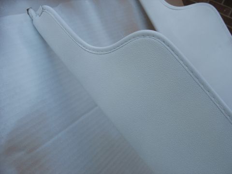 1978 Ford Bronco - White vinyl interior trim panel with stitched edging.