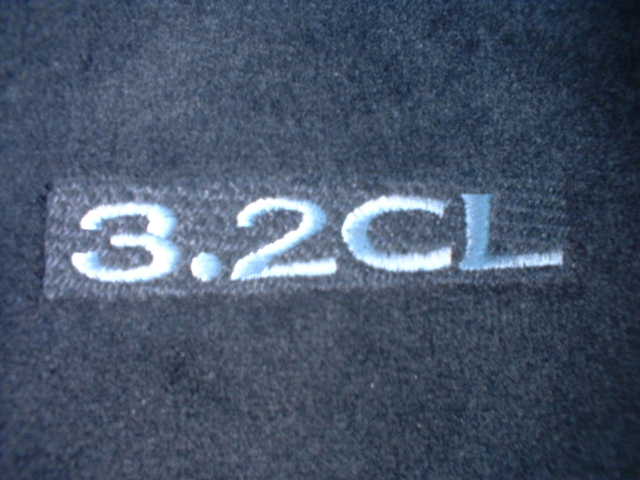 Black carpet floor mat embroidered 3.2CL in silver thread