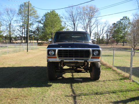 1978 Ford Bronco - Front-end photograph of a lifted late-1970s Ford Bronco, not a technical document.