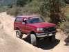 1996 Ford Bronco - This red Ford Bronco appears to be from the early to mid-1990s, possibly a 1992 model.