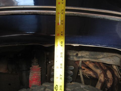 1978 Ford Bronco - A tape measure is used to document the lift height on a vehicle, showing approximately 40 inches of clearance.