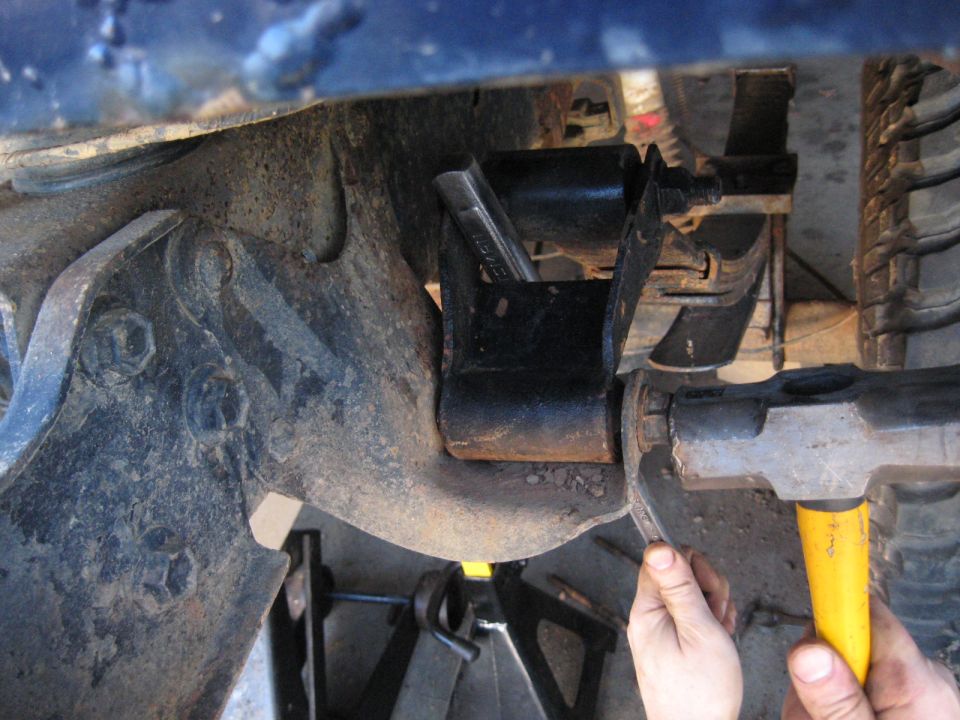 Close-up of suspension part with tools