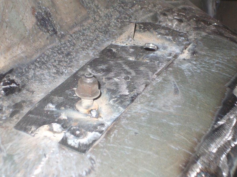 drivers side seat belt repad welded on fender