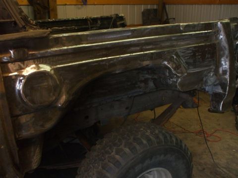 1995 Ford Bronco - outside drivers tub prepped for rust bullet