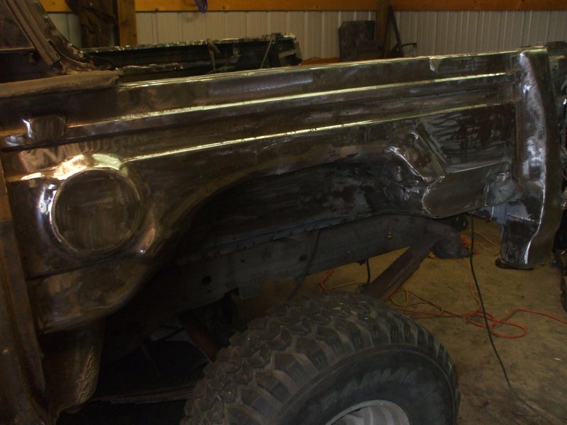 outside drivers tub prepped for rust bullet