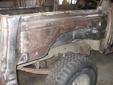 1995 Ford Bronco - outside passengers tub prepped for rust bullet