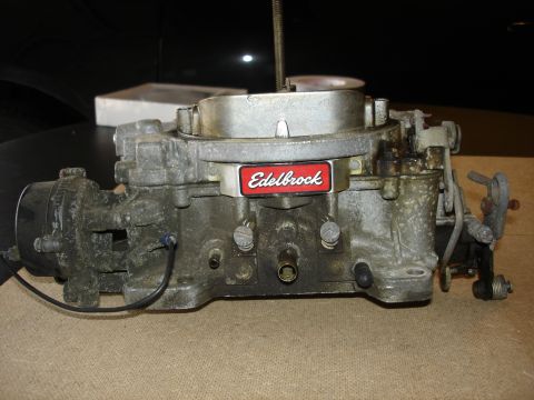 1987 Ford Crown Victoria LTD - Close-up of an Edelbrock carburetor, likely for a performance tune-up or rebuild.