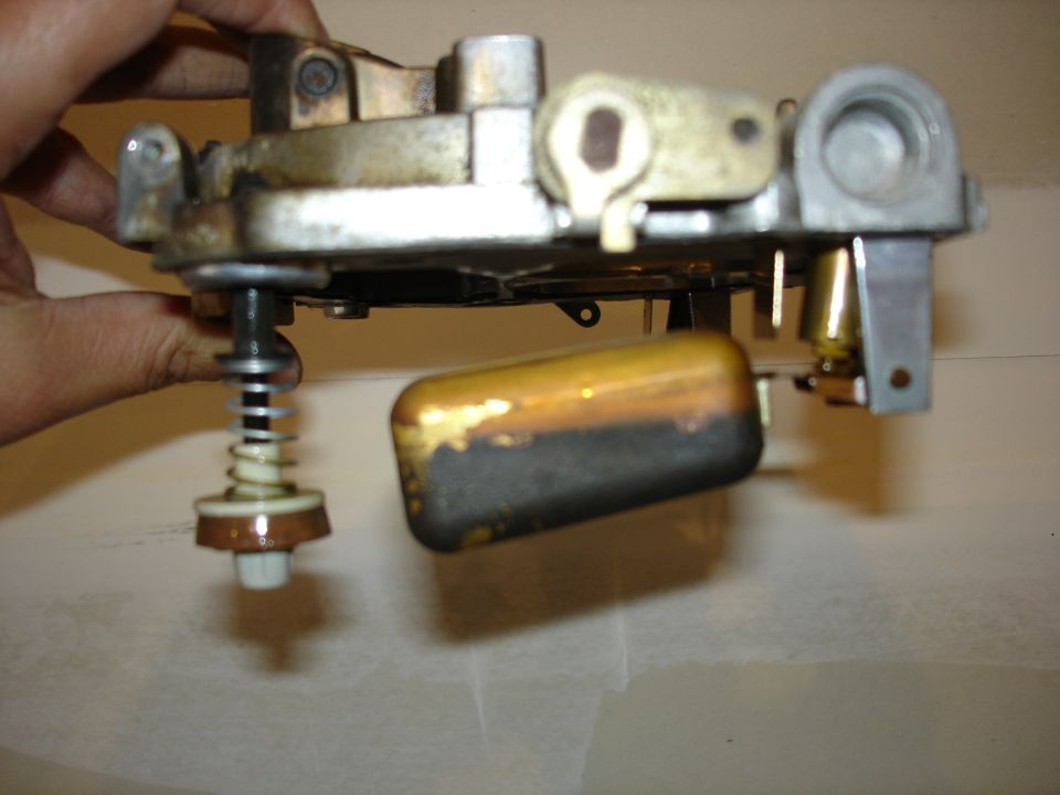 Carburetor float assembly with brass float and spring-loaded needle valve
