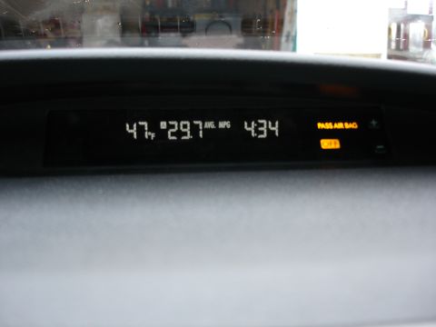 2008 Subaru Impreza - The vehicle's digital display shows the outside temperature, average fuel economy, current time, and the status of the passenger airbag.