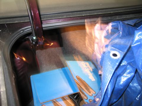 1991 Ford LTD Crown Victoria - Photograph of a vehicle trunk interior, not a technical document.