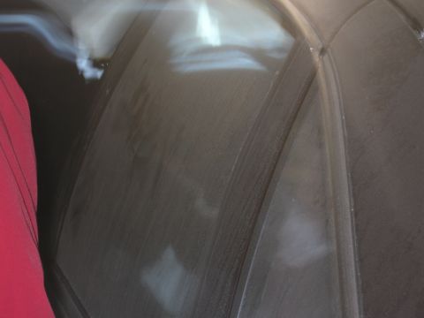 1991 Ford LTD Crown Victoria - Photograph of a dark vehicle panel, not a technical document.