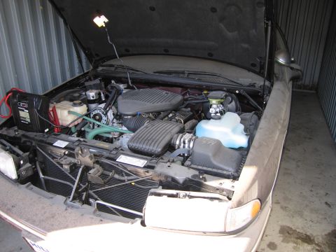 1991 Ford LTD Crown Victoria - Photograph of an open engine bay, not a technical document.