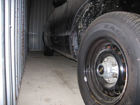 1991 Ford LTD Crown Victoria - Photograph of a wheel and tire, not a technical document.