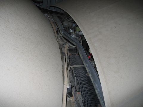 1991 Ford LTD Crown Victoria - Photograph of a cowl and wiper area, not a technical document.