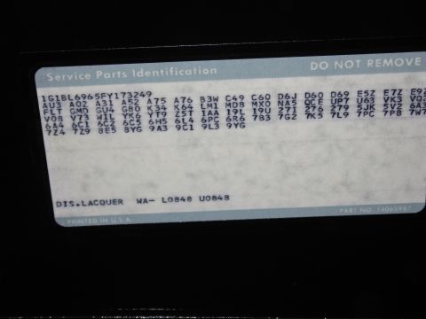 1991 Ford LTD Crown Victoria - GM Service Parts Identification (build/RPO) label listing VIN, paint code WA-L0848 and option codes.