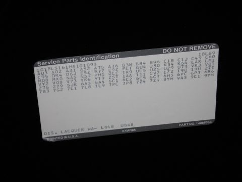 1991 Ford LTD Crown Victoria - GM Service Parts Identification label listing factory RPO option codes and paint code WA-L848, marked Do Not Remove.